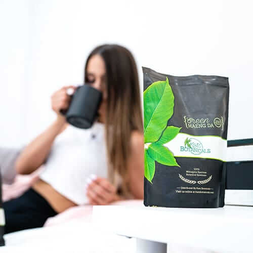woman drinking kats botanicals green maeng da kratom tea